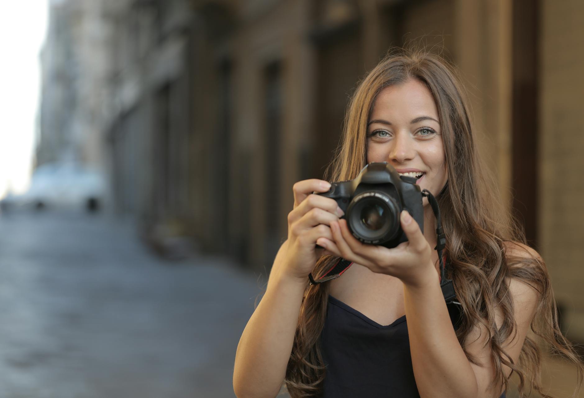 Happy smiling woman in a casual setting looking at the camera